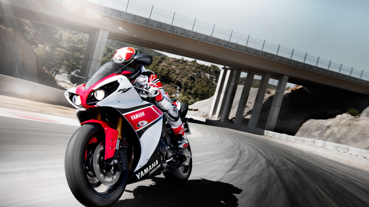 Man in Red and Black Sports Bike on Road During Daytime. Wallpaper in 1280x720 Resolution