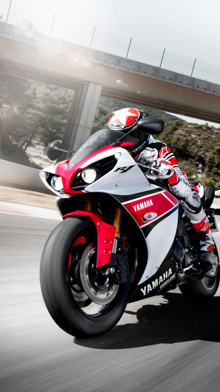 Man in Red and Black Sports Bike on Road During Daytime. Wallpaper in 750x1334 Resolution