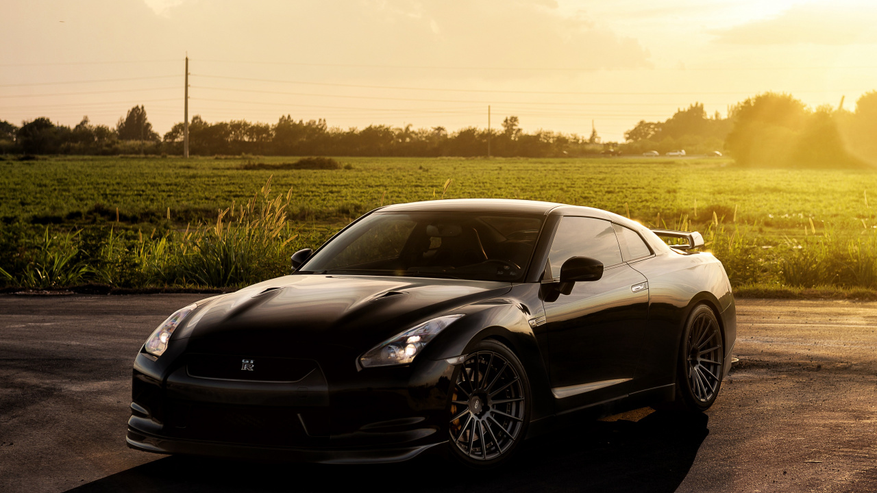 Schwarzer Porsche 911 Tagsüber Unterwegs. Wallpaper in 1280x720 Resolution