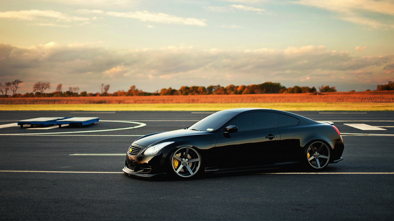 Black Coupe on Gray Asphalt Road During Daytime. Wallpaper in 1366x768 Resolution