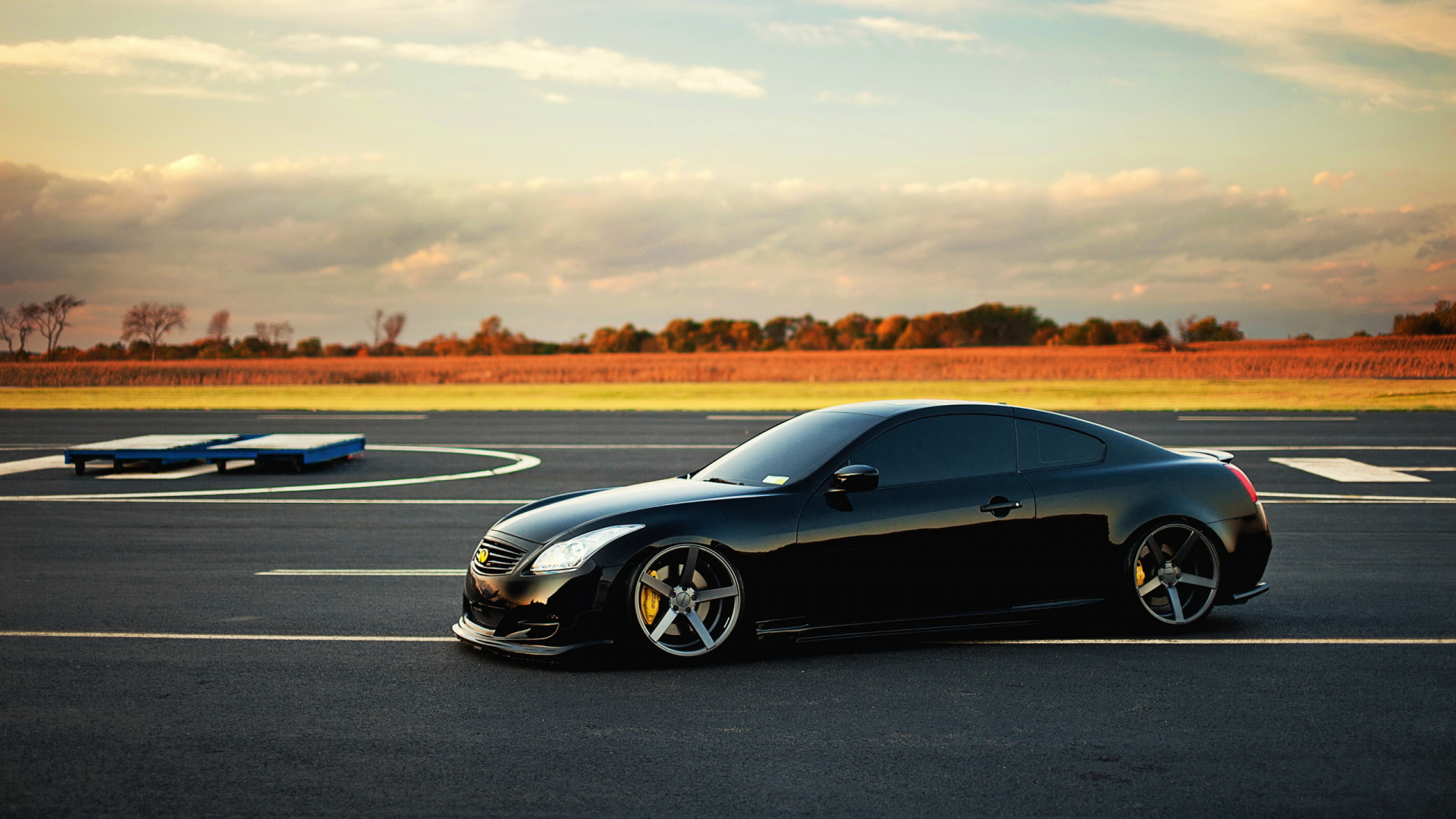 Black Coupe on Gray Asphalt Road During Daytime. Wallpaper in 1920x1080 Resolution