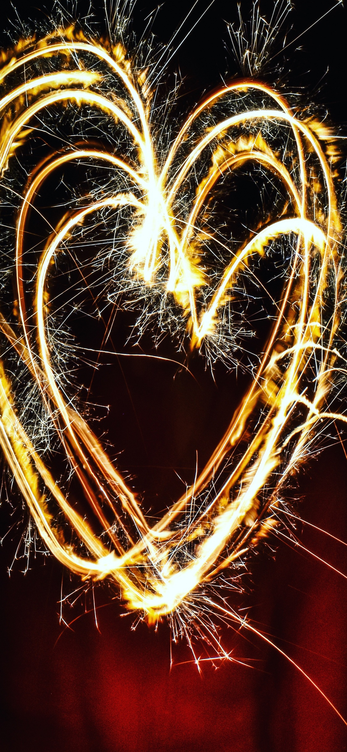 Sparkler, Fireworks, Heart, Light, Love. Wallpaper in 1125x2436 Resolution