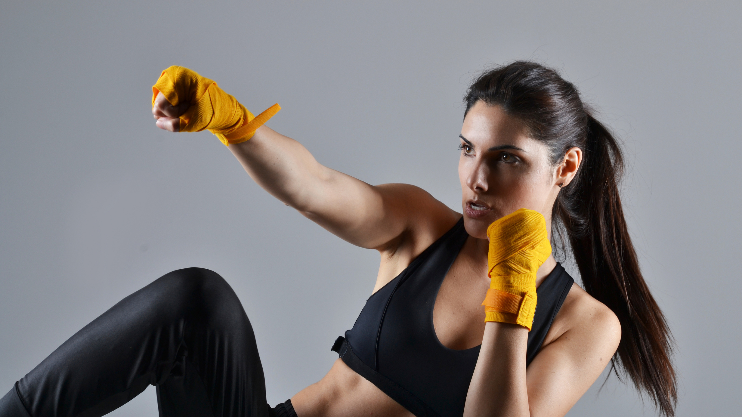 Woman in Black Sports Bra and Black Pants. Wallpaper in 2560x1440 Resolution