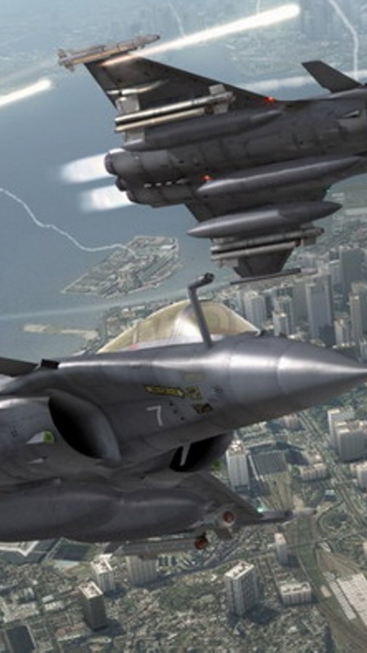 Grauer Kampfjet Tagsüber in Der Luft. Wallpaper in 720x1280 Resolution