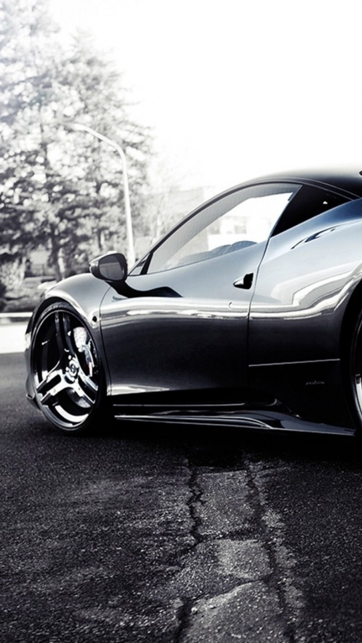 Porsche 911 Noire Garée Sur Route. Wallpaper in 720x1280 Resolution