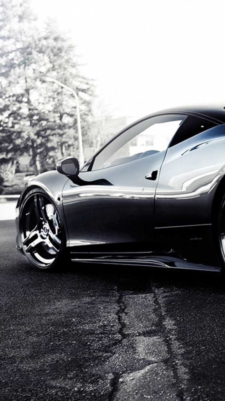 Porsche 911 Noire Garée Sur Route. Wallpaper in 750x1334 Resolution