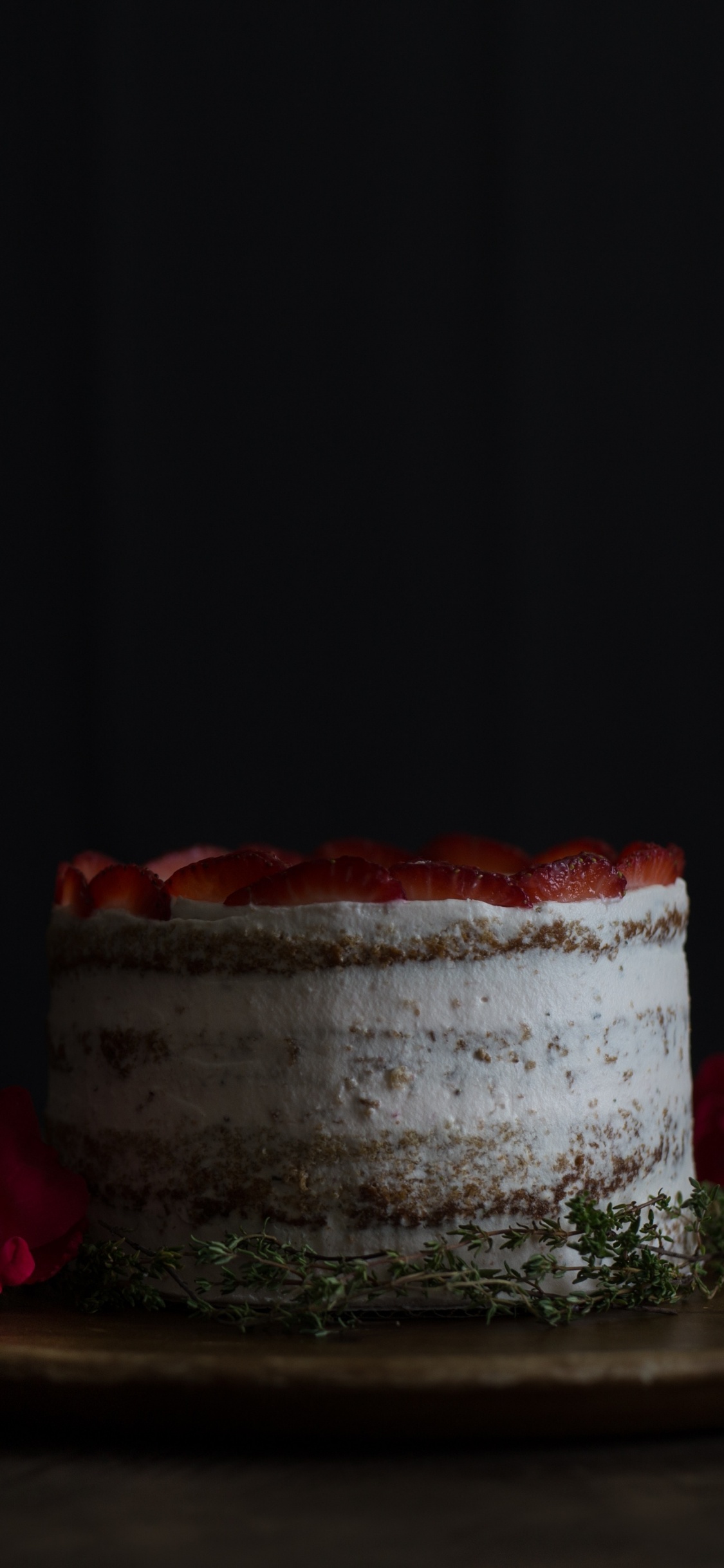 White and Red Cake on Brown Wooden Table. Wallpaper in 1125x2436 Resolution