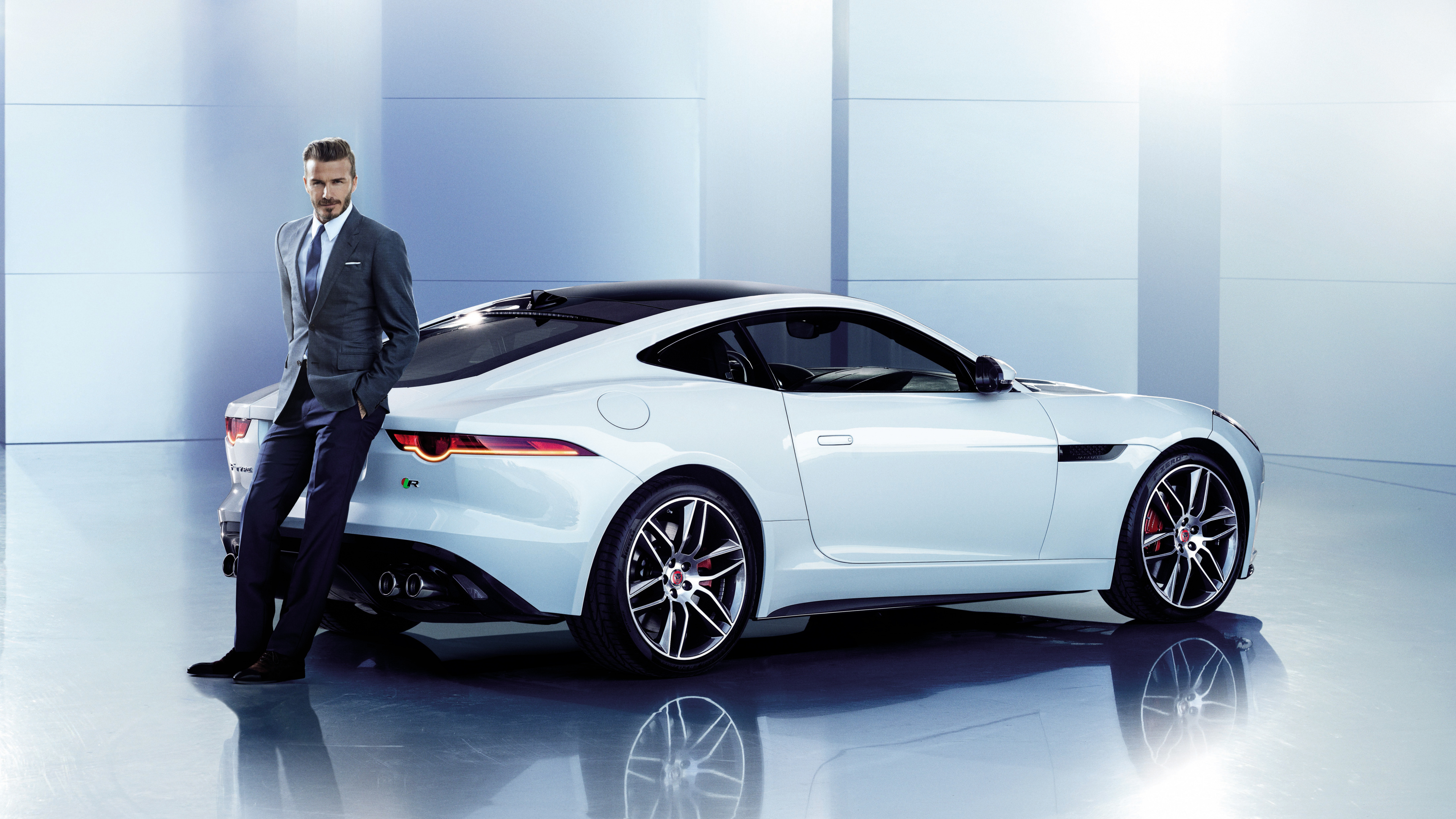 Man in Black Suit Standing Beside White Porsche 911 Coupe. Wallpaper in 3840x2160 Resolution
