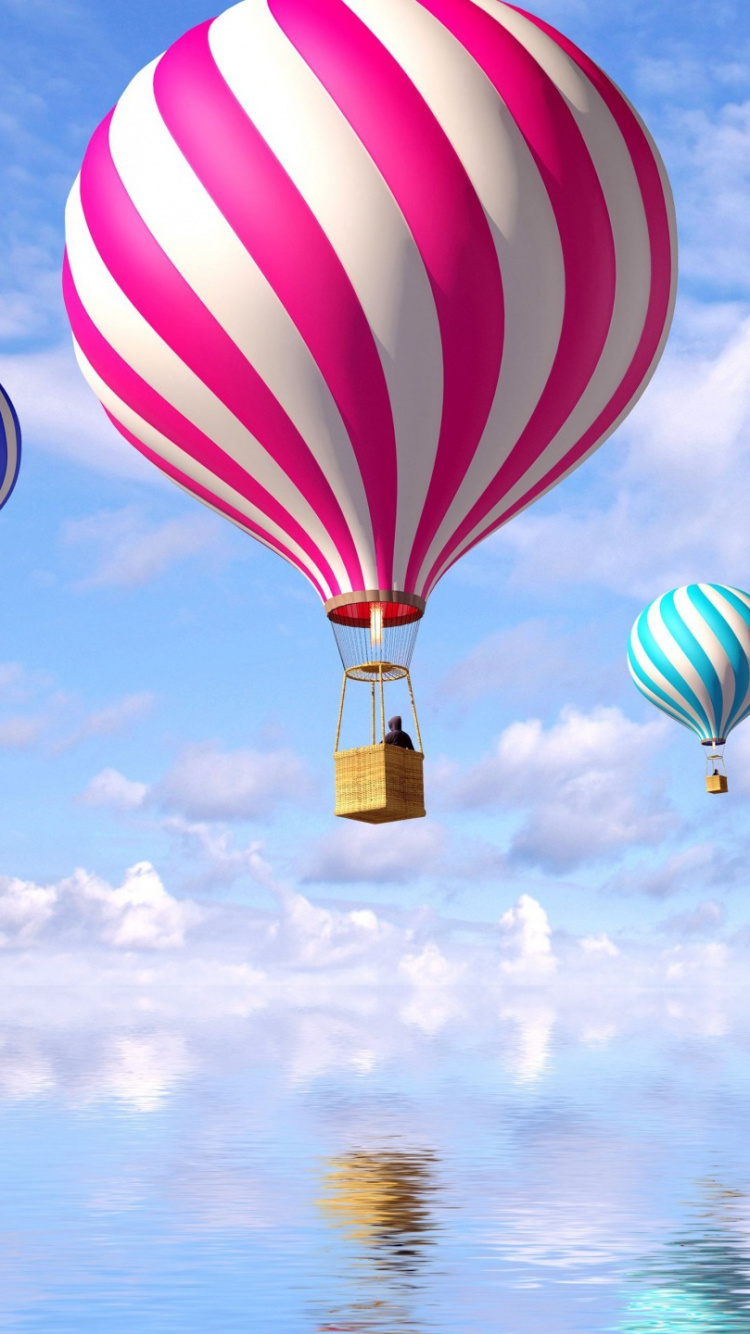 Red Blue and Yellow Hot Air Balloon in Mid Air During Daytime. Wallpaper in 750x1334 Resolution