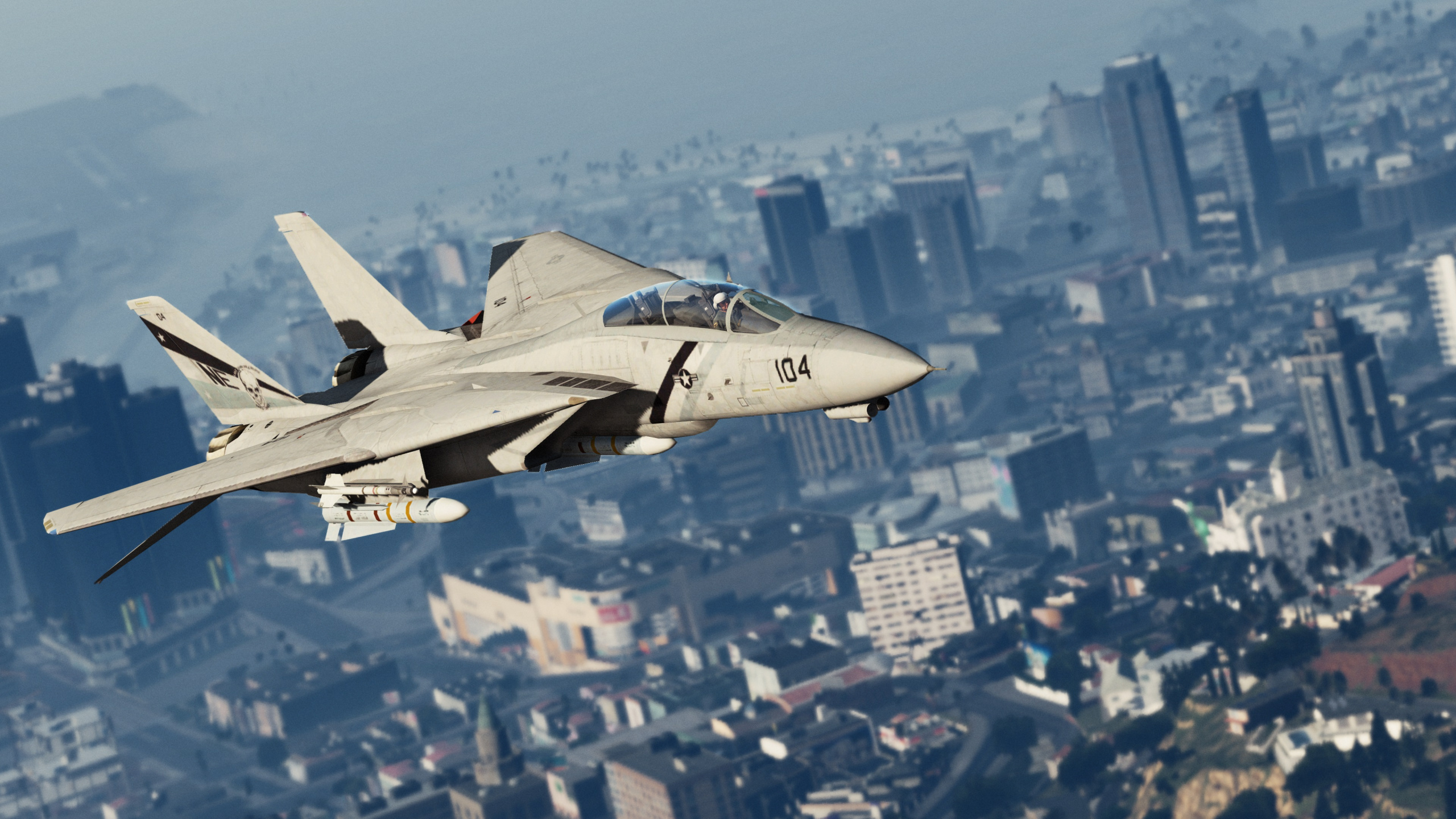 Weißes Und Graues Düsenflugzeug, Das Tagsüber Über Stadtgebäude Fliegt. Wallpaper in 2560x1440 Resolution