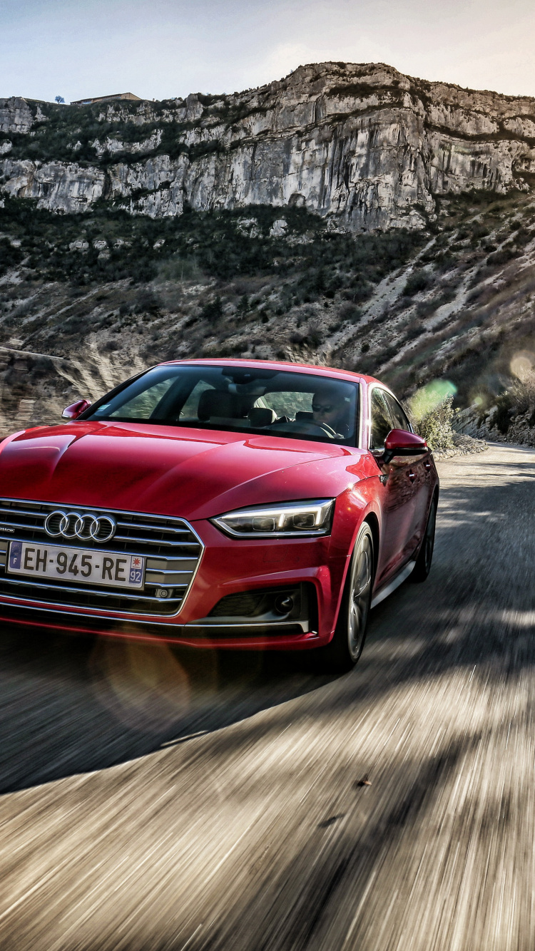 Red Audi a 4 on Road During Daytime. Wallpaper in 750x1334 Resolution