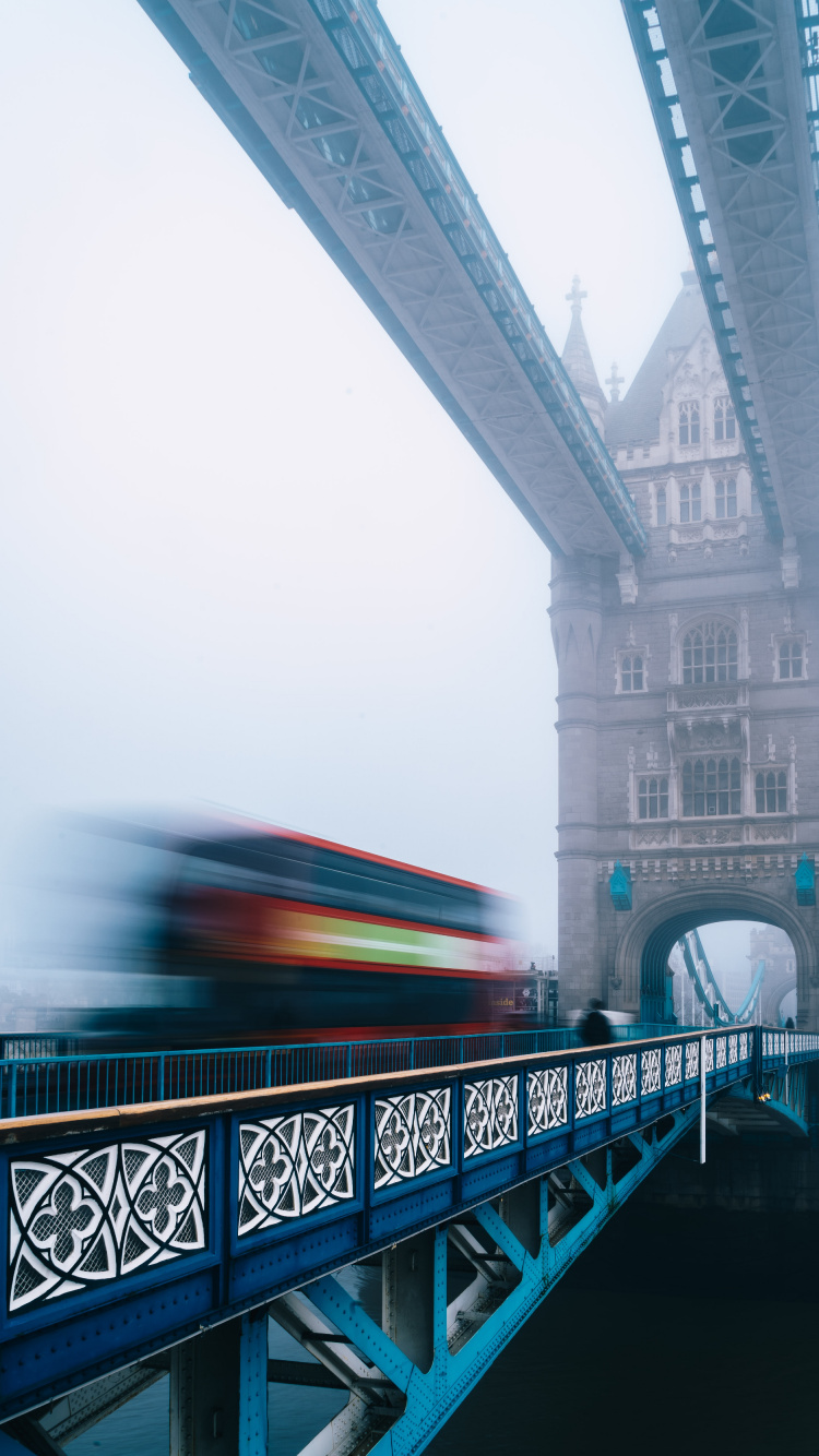 Blue Metal Bridge Over River During Daytime. Wallpaper in 750x1334 Resolution