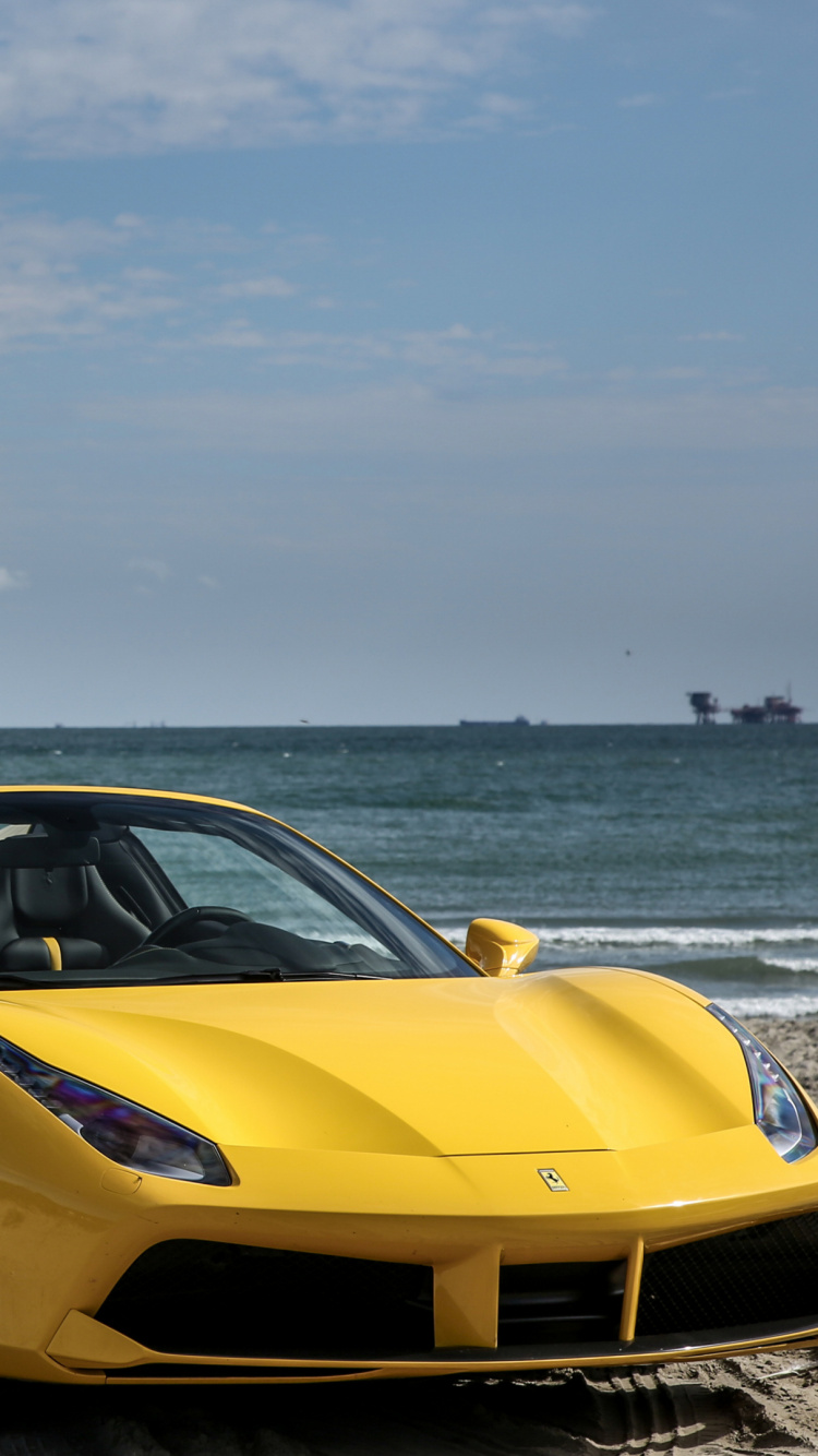 Ferrari 458 Italia Amarillo en la Playa Durante el Día. Wallpaper in 750x1334 Resolution