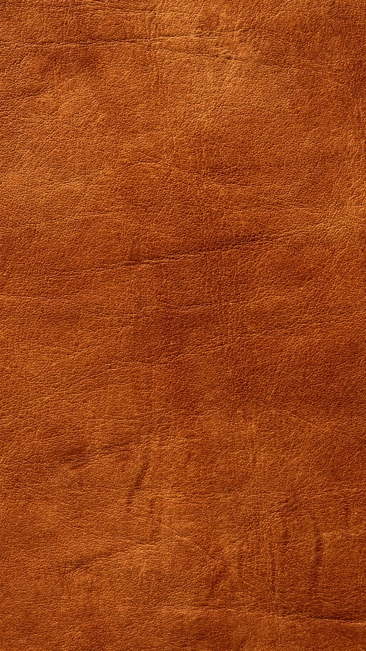 Braunes Textil Auf Braunem Holztisch. Wallpaper in 720x1280 Resolution