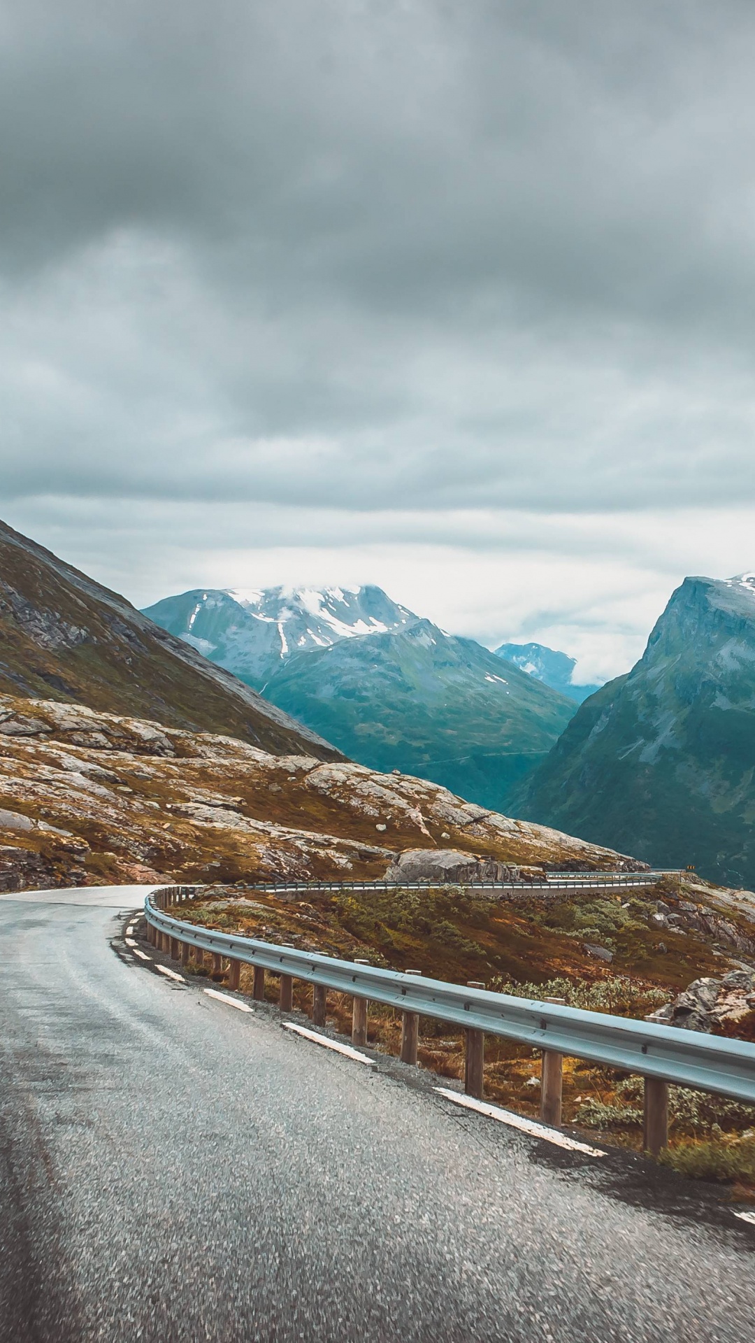 Gray Concrete Road Near Mountains During Daytime. Wallpaper in 1080x1920 Resolution