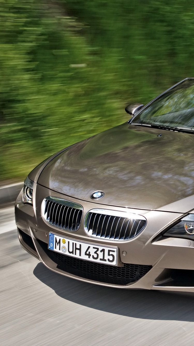 Black Mercedes Benz Convertible Coupe on Road During Daytime. Wallpaper in 750x1334 Resolution