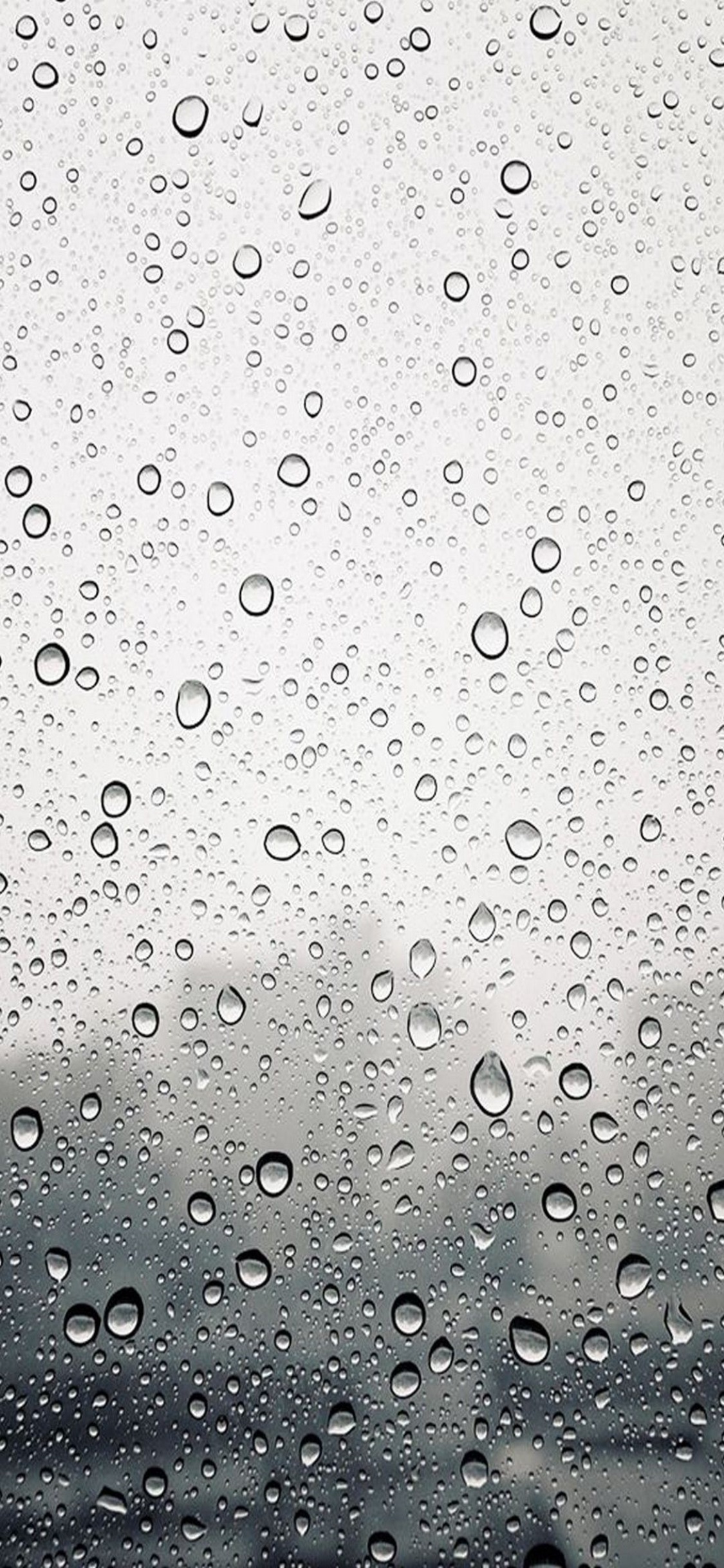 Gotas de Agua Sobre Vidrio Transparente. Wallpaper in 1125x2436 Resolution