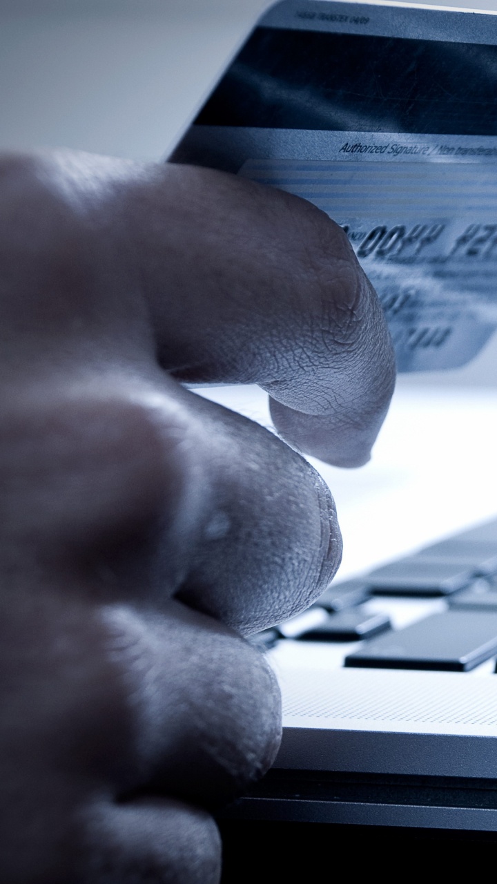 Grayscale Photo of Person Using Laptop Computer. Wallpaper in 720x1280 Resolution