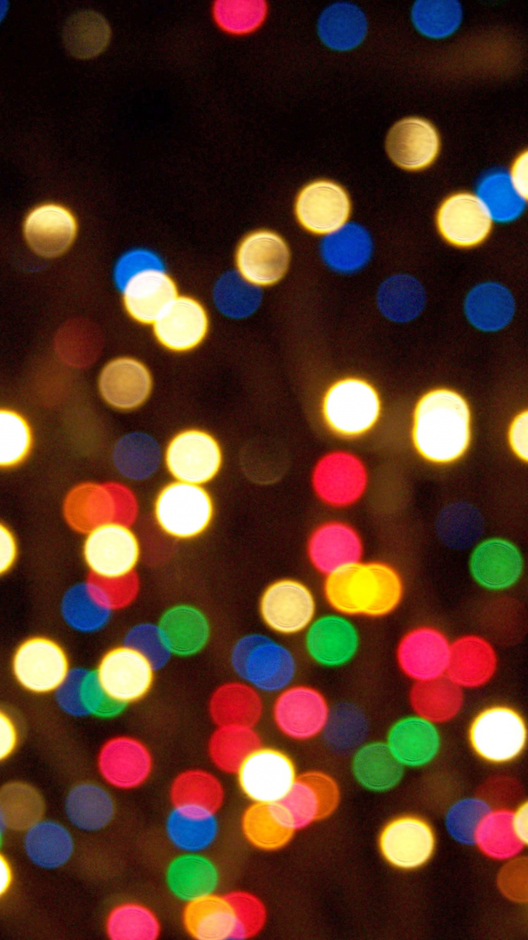 Bokeh-Fotografie Von Lichtern in Der Nacht. Wallpaper in 750x1334 Resolution