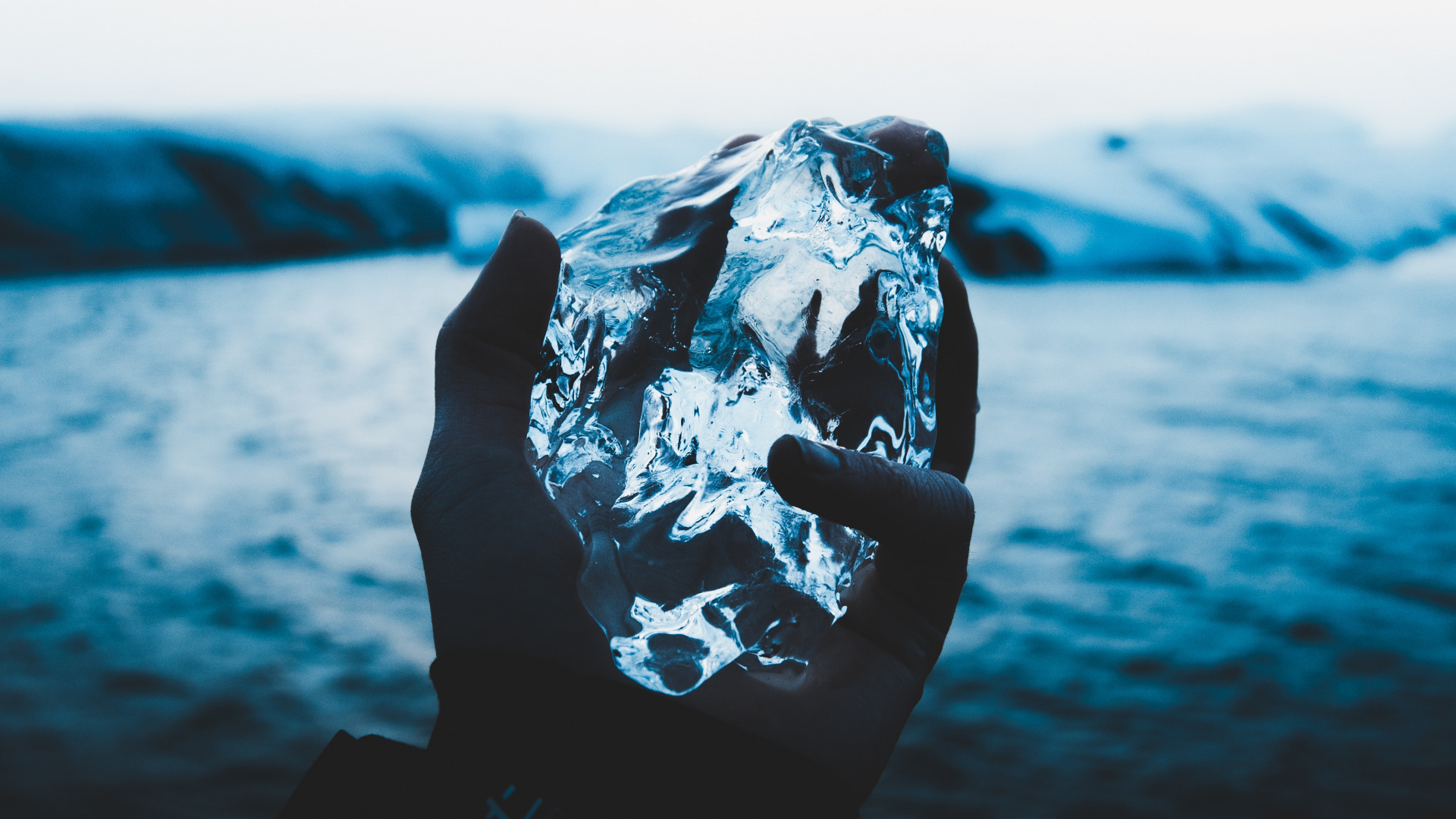 Person Holding Ice on The Air. Wallpaper in 1920x1080 Resolution