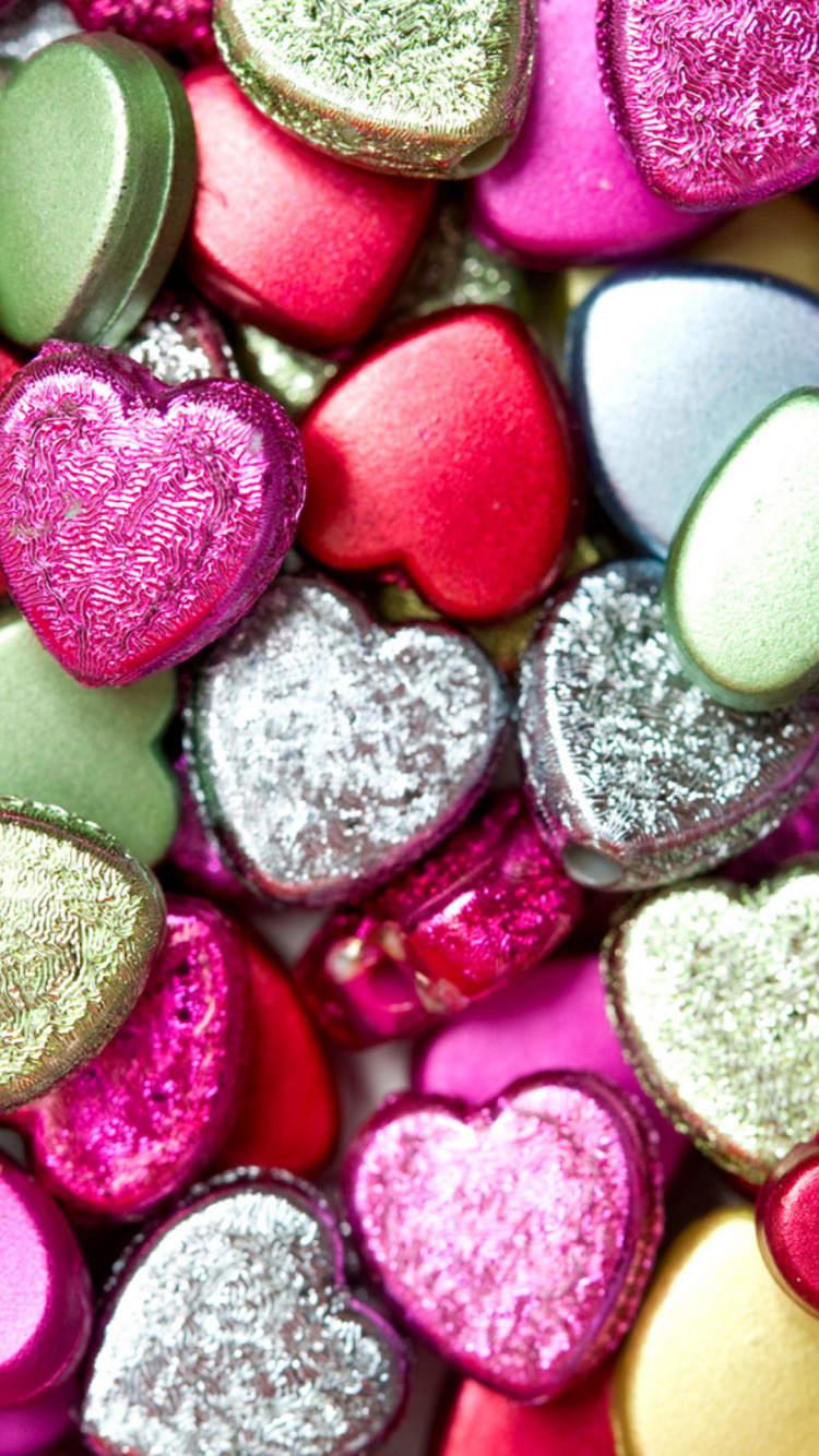 Pink Yellow and Purple Heart Shaped Candies. Wallpaper in 750x1334 Resolution