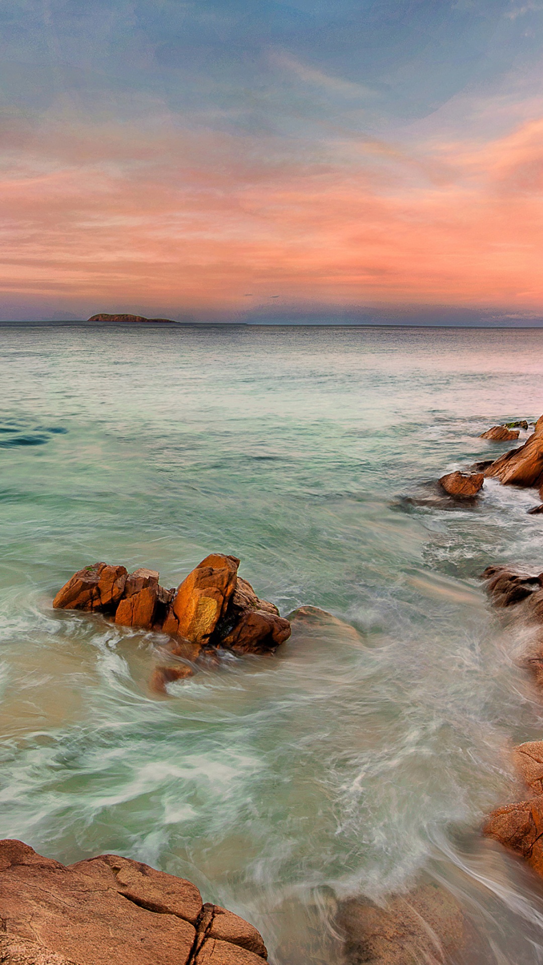 Brown Rock Formation on Body of Water During Daytime. Wallpaper in 1080x1920 Resolution