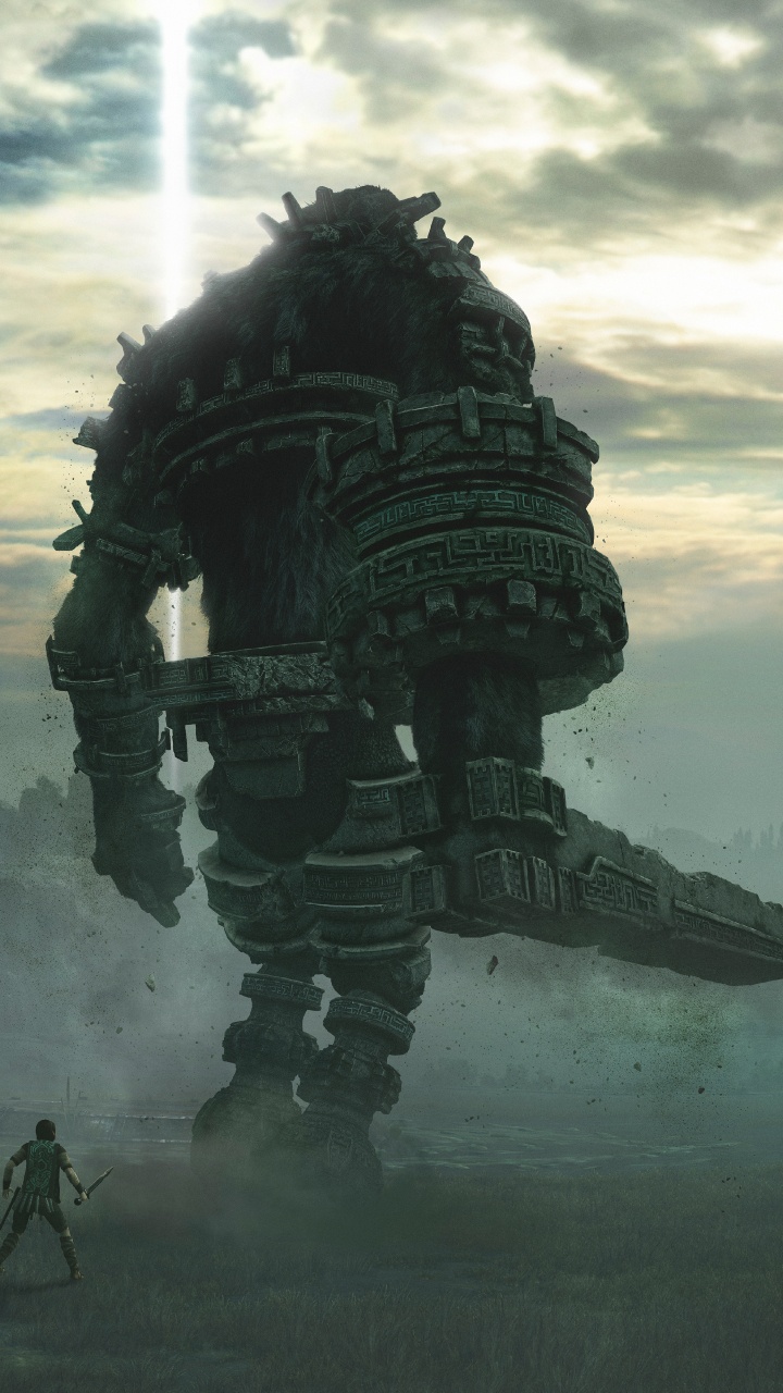 Robot Noir et Gris Sur Terrain D'herbe Verte Pendant la Journée. Wallpaper in 720x1280 Resolution