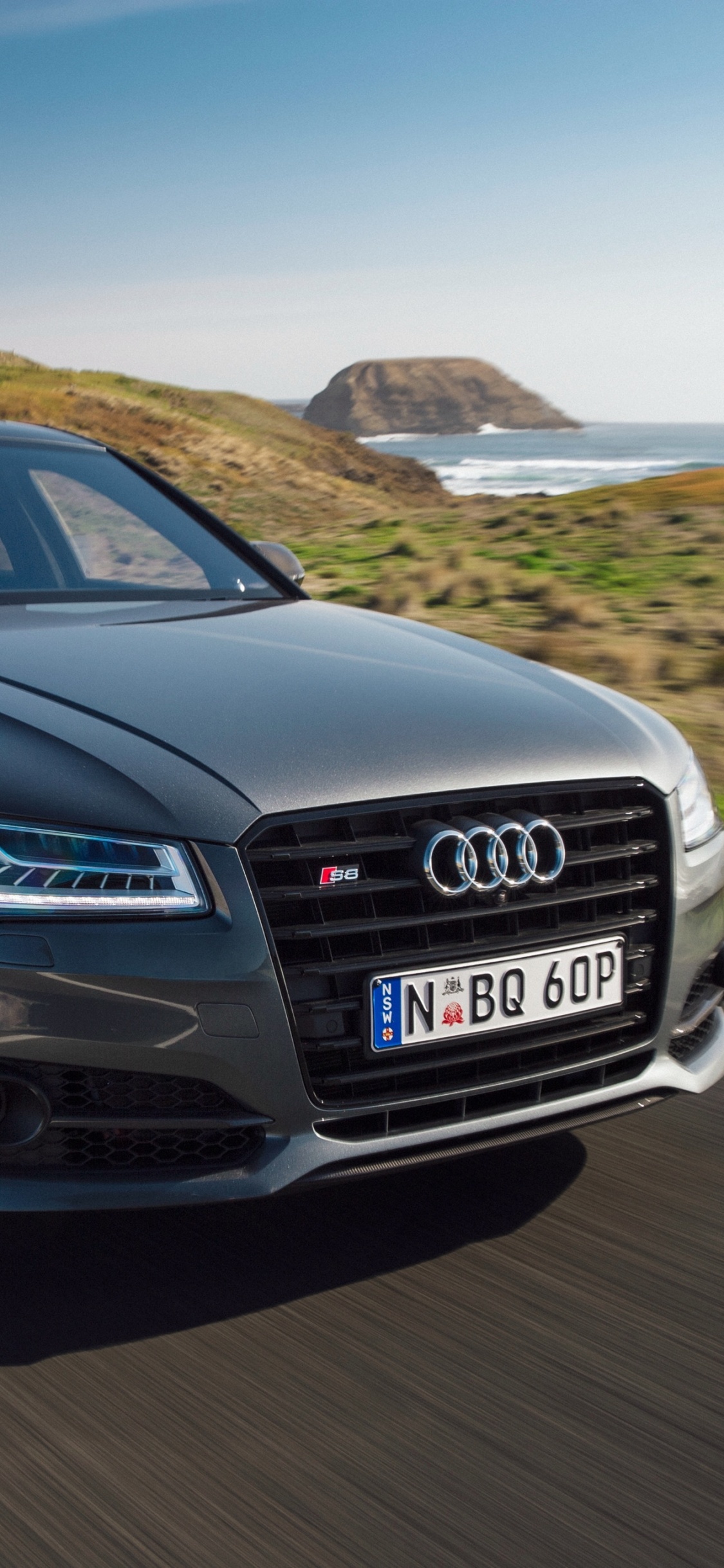 Black Audi a 4 on Road During Daytime. Wallpaper in 1125x2436 Resolution