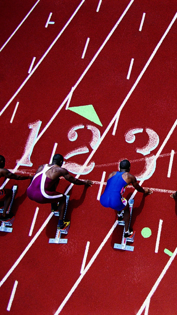 Gruppe Von Menschen in Blauen Und Roten Hemden. Wallpaper in 720x1280 Resolution