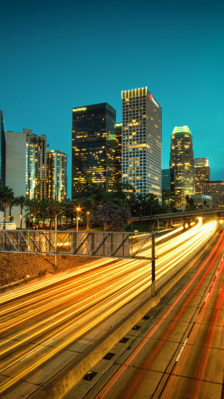 Time Lapse Photography of City During Night Time. Wallpaper in 750x1334 Resolution