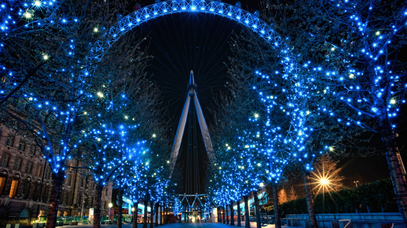 Blue String Lights on Street During Night Time. Wallpaper in 1366x768 Resolution