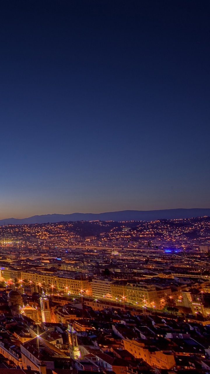 Horizonte de la Ciudad Durante la Noche. Wallpaper in 720x1280 Resolution