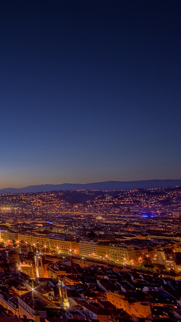 Horizon de la Ville Pendant la Nuit. Wallpaper in 750x1334 Resolution