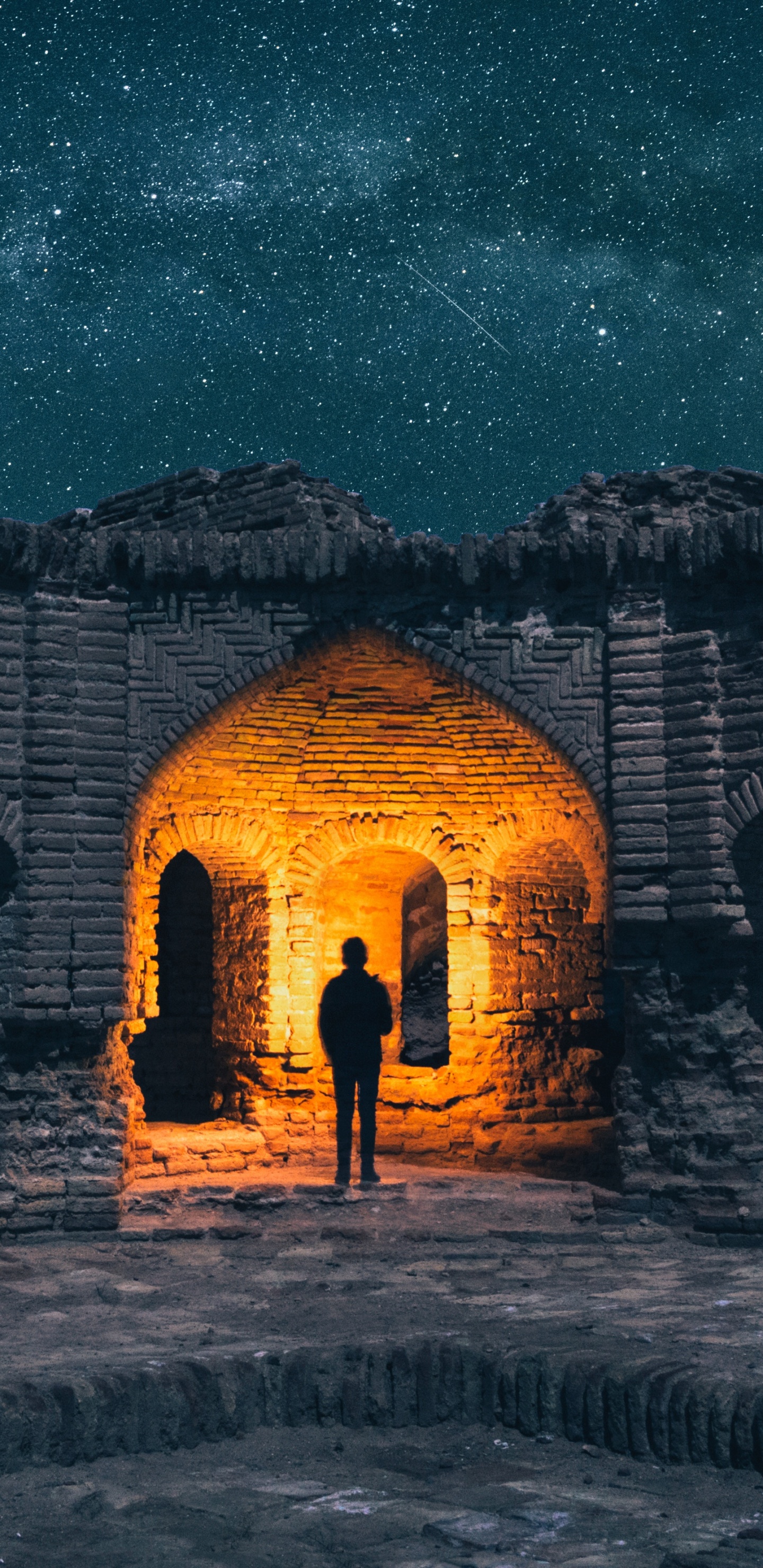 Brown Brick Building Under Starry Night. Wallpaper in 1440x2960 Resolution