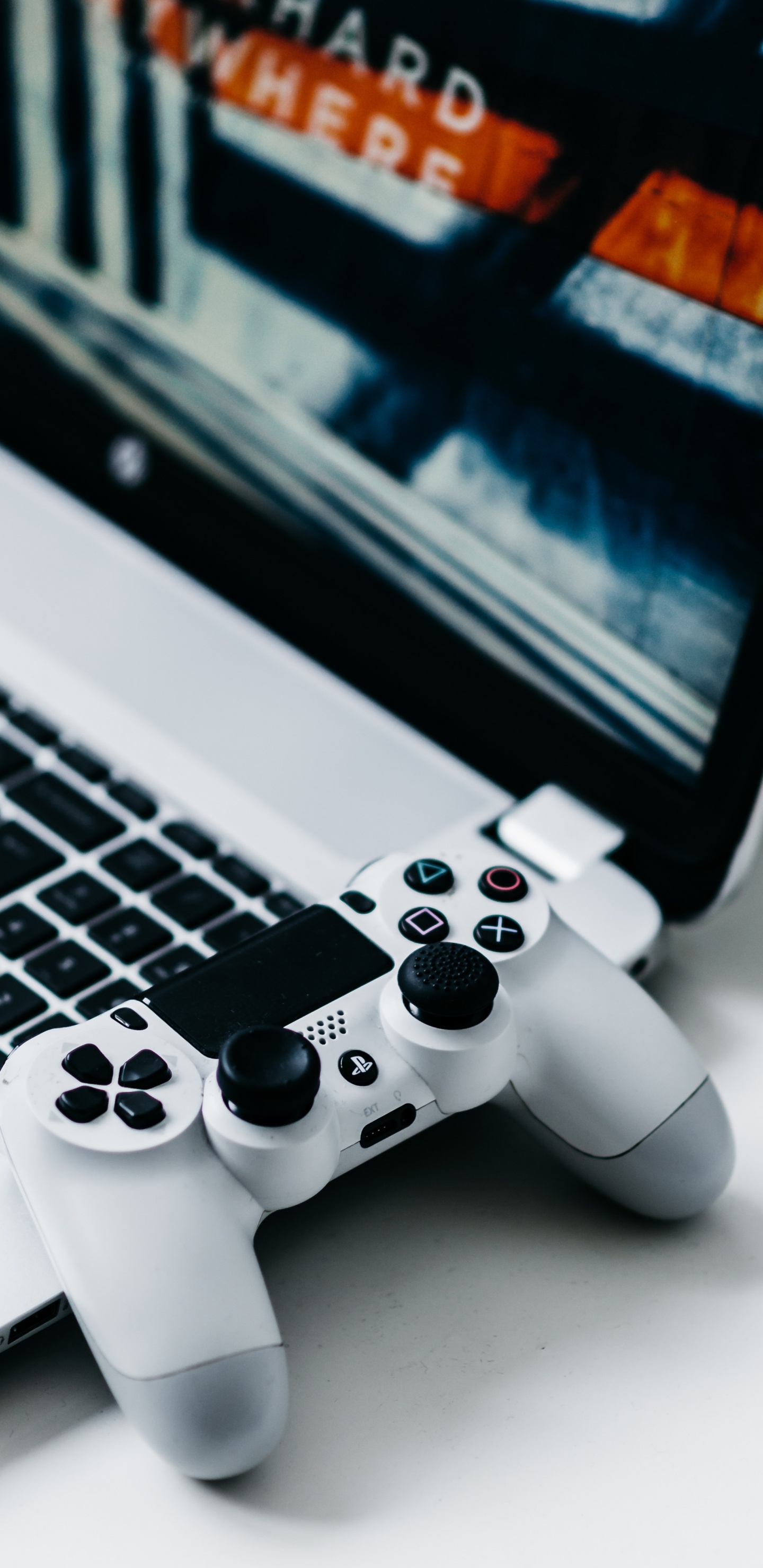 Controlador Sony ps 4 Blanco en Macbook Pro. Wallpaper in 1440x2960 Resolution