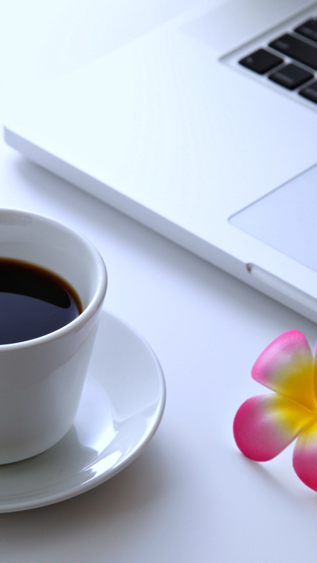 White Ceramic Cup on White Saucer Beside Macbook Pro. Wallpaper in 1080x1920 Resolution