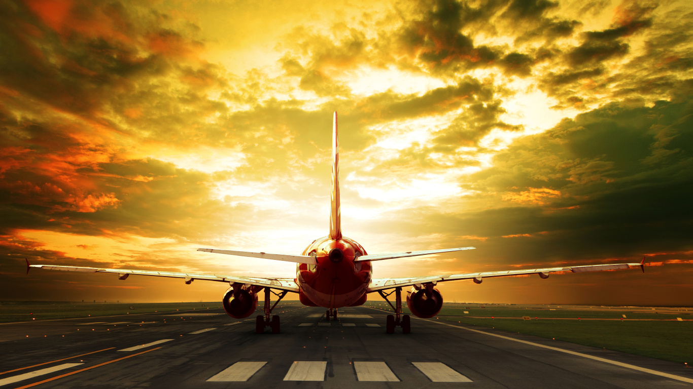Red and White Plane on Airport During Sunset. Wallpaper in 1366x768 Resolution