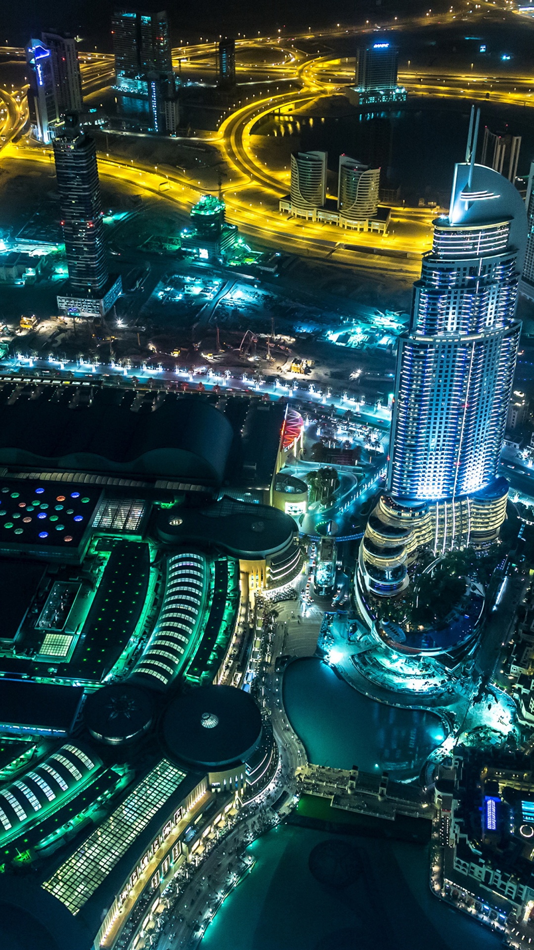 Vue Aérienne Des Bâtiments de la Ville Pendant la Nuit. Wallpaper in 1080x1920 Resolution