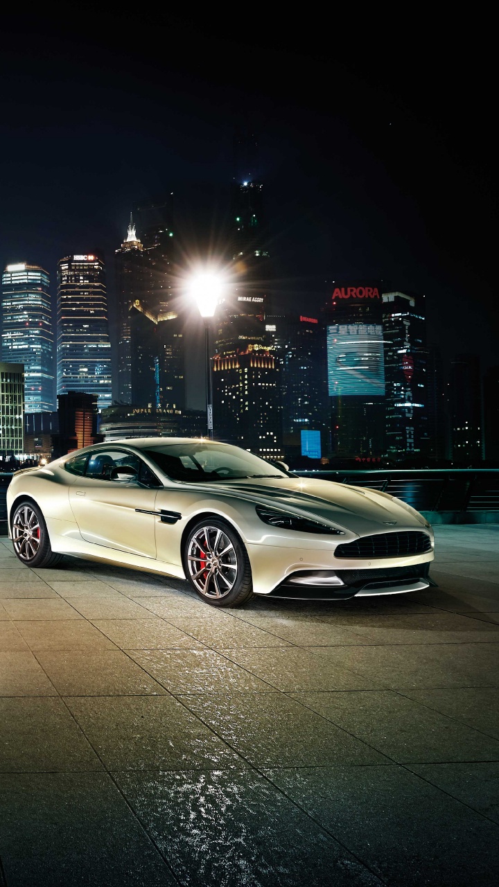 White Coupe on Road During Night Time. Wallpaper in 720x1280 Resolution