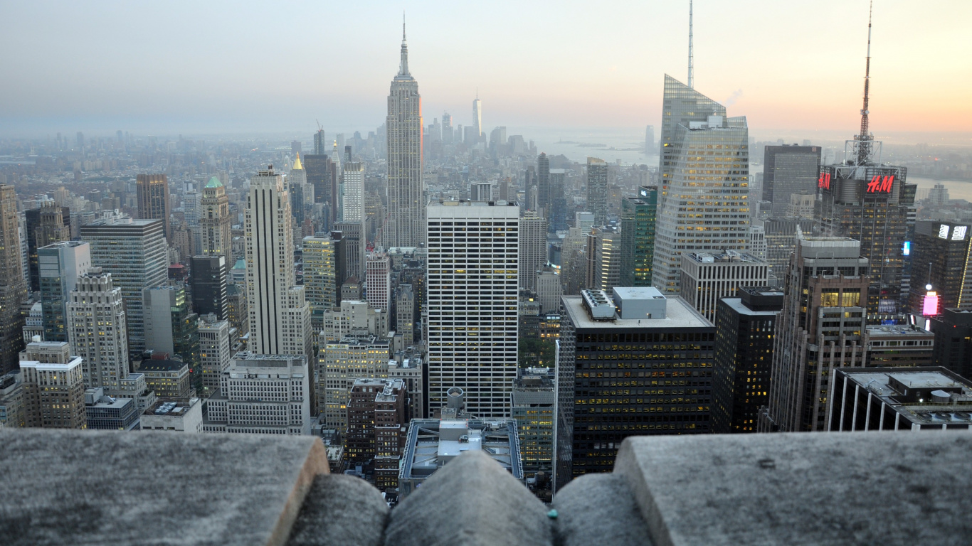 City Skyline Under White Sky During Daytime. Wallpaper in 1366x768 Resolution