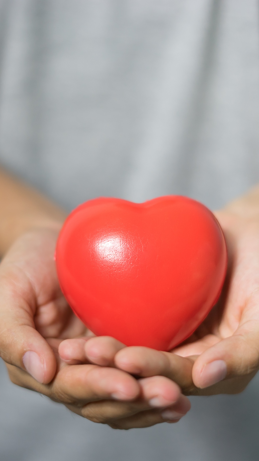 Person Holding Red Tomato Fruit. Wallpaper in 1080x1920 Resolution