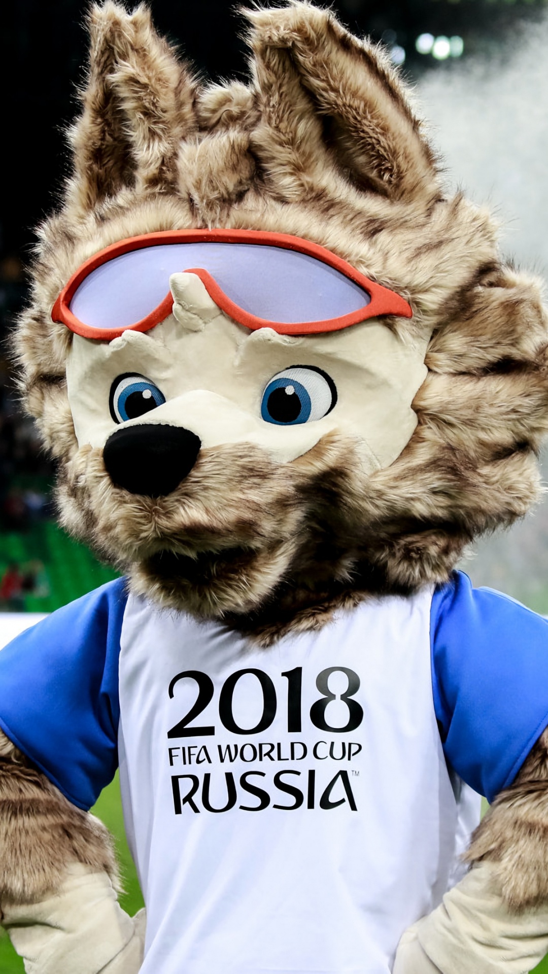 Brown Bear Plush Toy Wearing Blue and White Shirt. Wallpaper in 1080x1920 Resolution