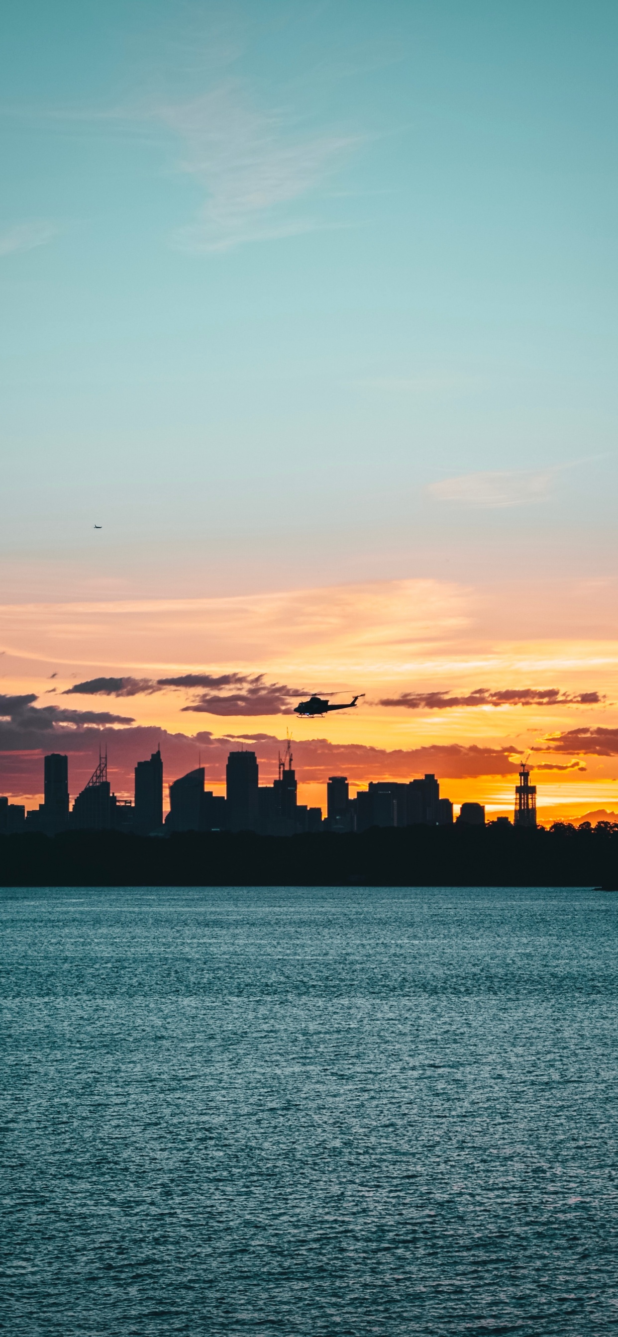 Silhouette of Buildings During Sunset. Wallpaper in 1242x2688 Resolution