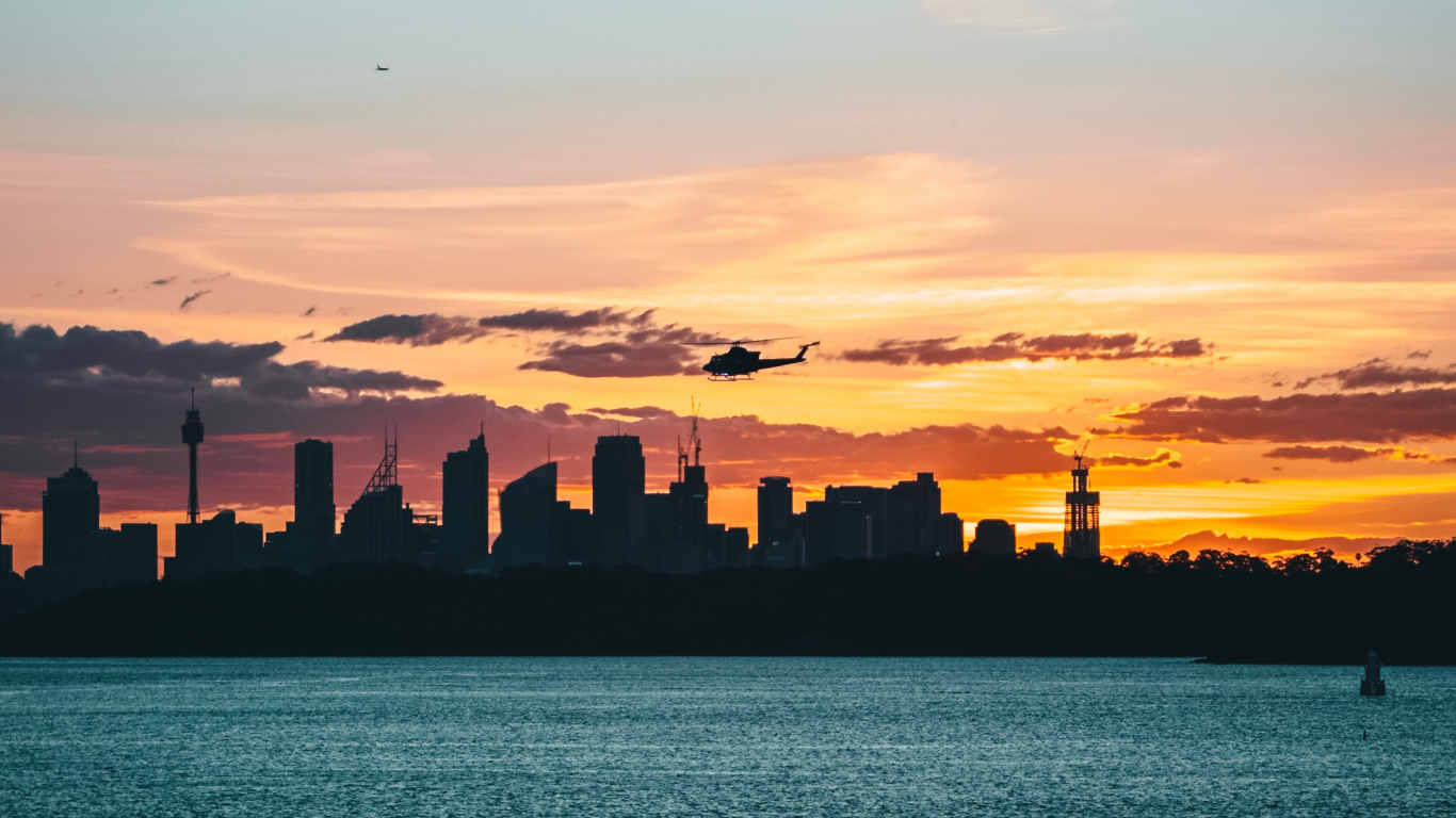 Silhouette of Buildings During Sunset. Wallpaper in 1366x768 Resolution