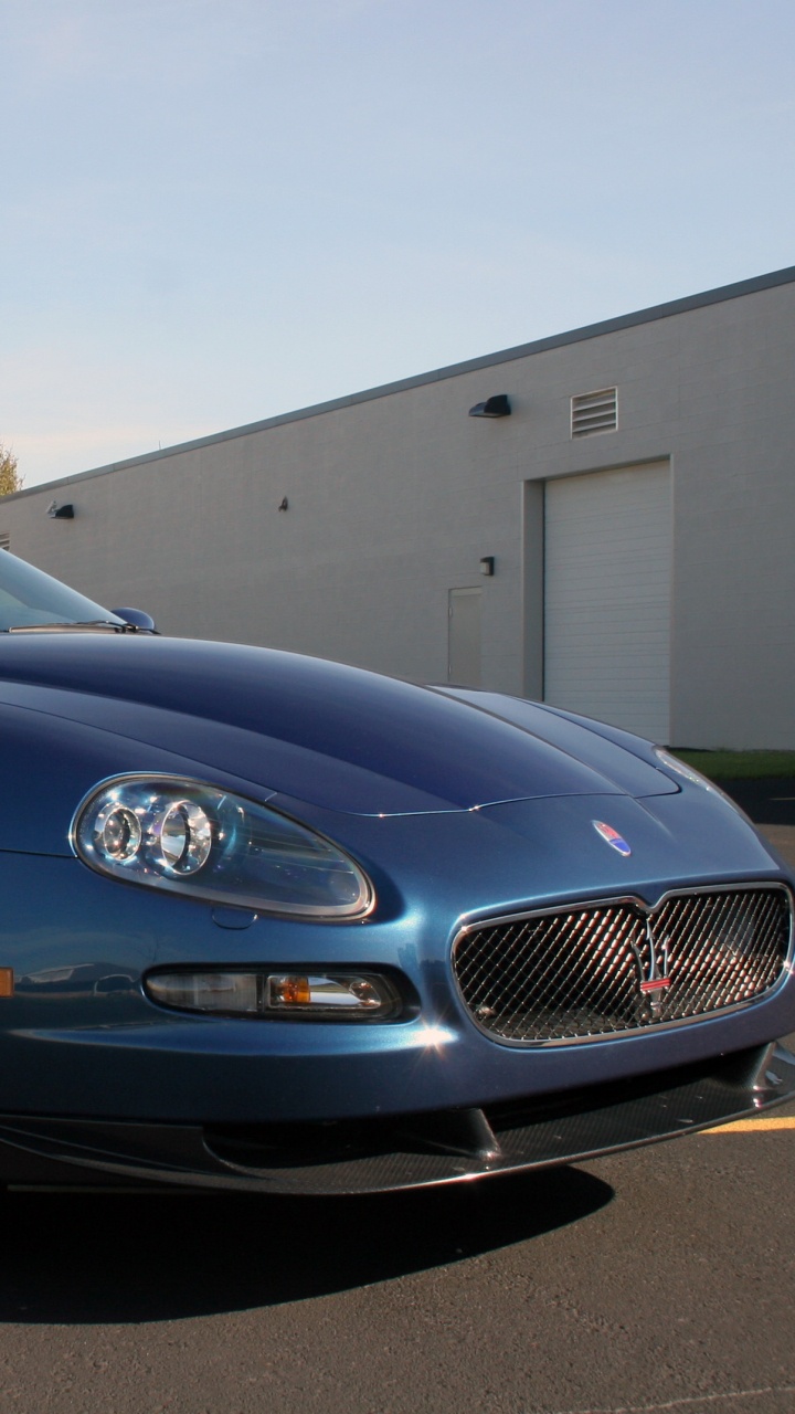 Schwarzes Mercedes-benz-coupé, Das Tagsüber Auf Dem Parkplatz Geparkt Ist. Wallpaper in 720x1280 Resolution