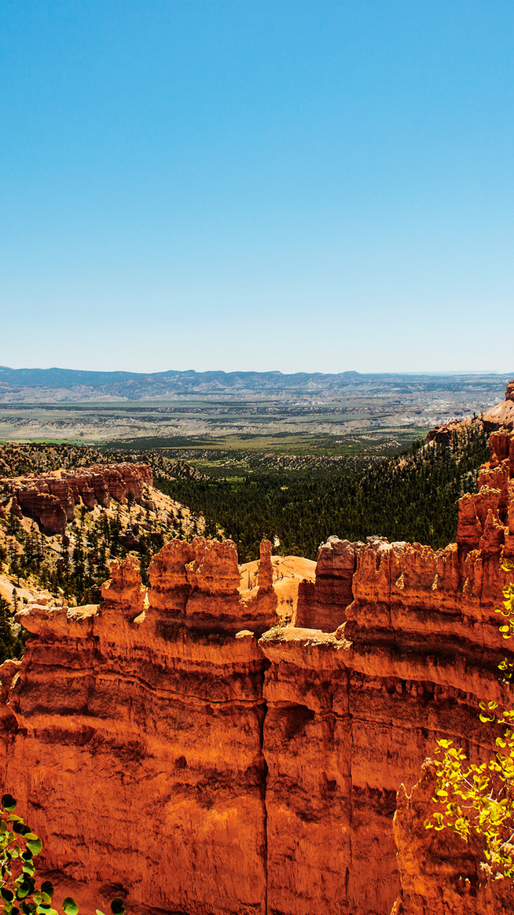 Brown Rock Formation Under Blue Sky During Daytime. Wallpaper in 750x1334 Resolution