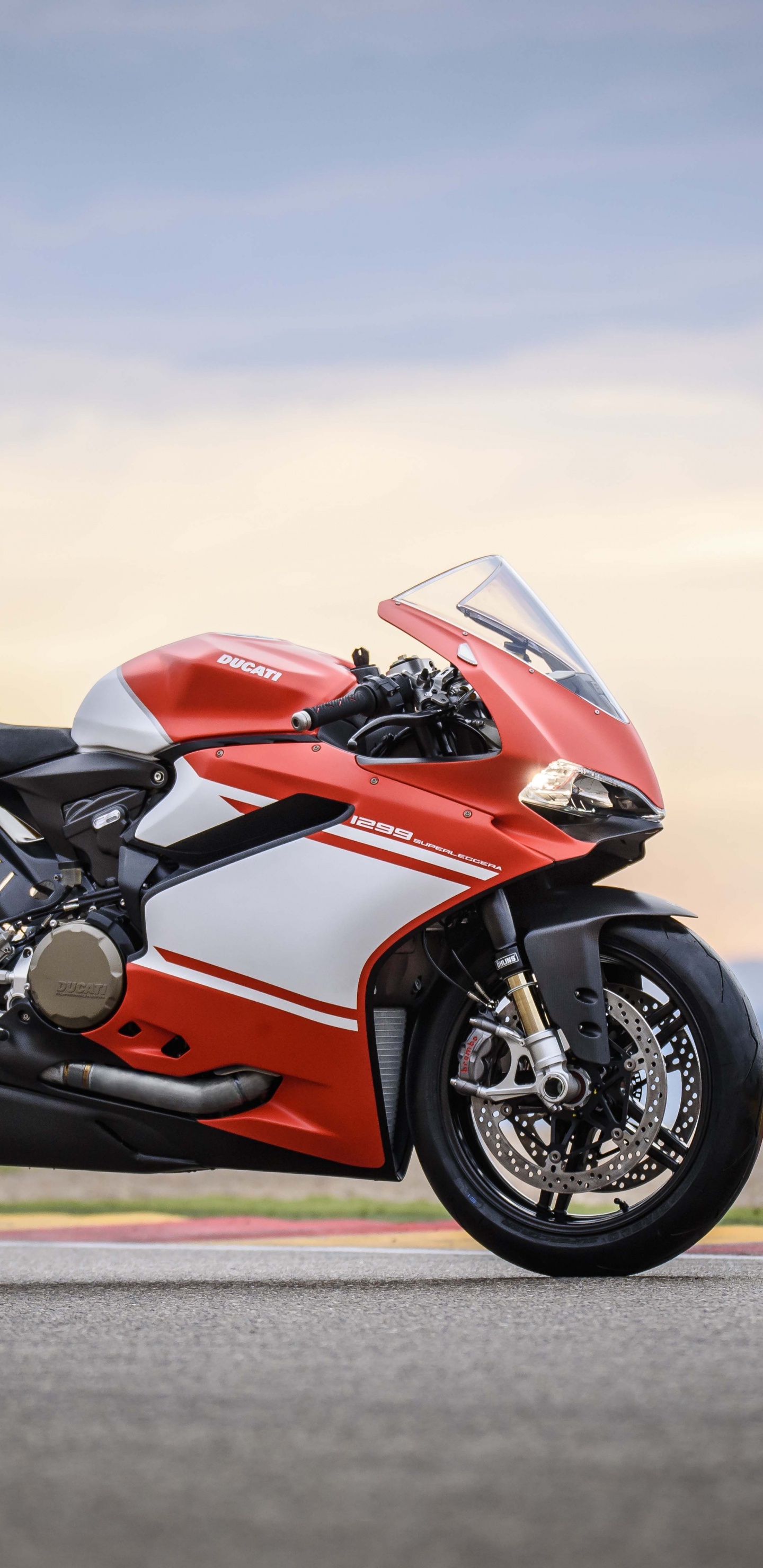 Red and Black Sports Bike on Road During Daytime. Wallpaper in 1440x2960 Resolution