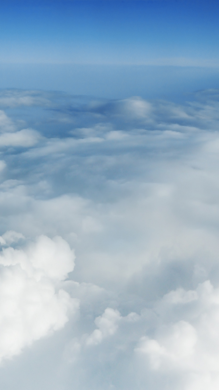 White Clouds and Blue Sky. Wallpaper in 750x1334 Resolution