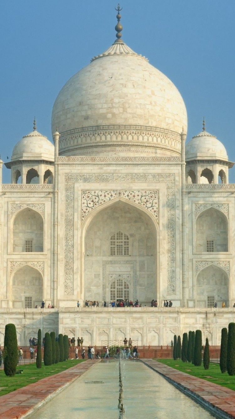 White Concrete Building Under Blue Sky During Daytime. Wallpaper in 750x1334 Resolution