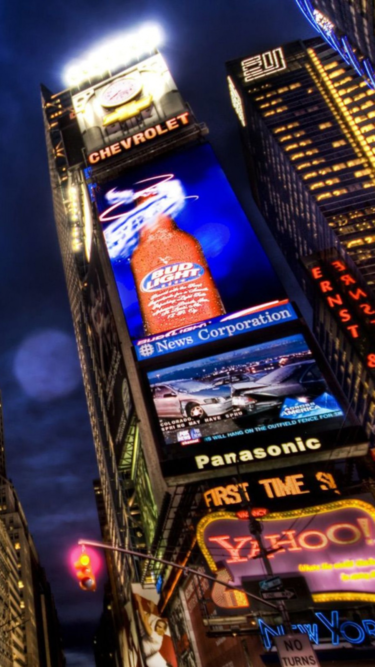 Low Angle Photography of High Rise Building During Night Time. Wallpaper in 750x1334 Resolution